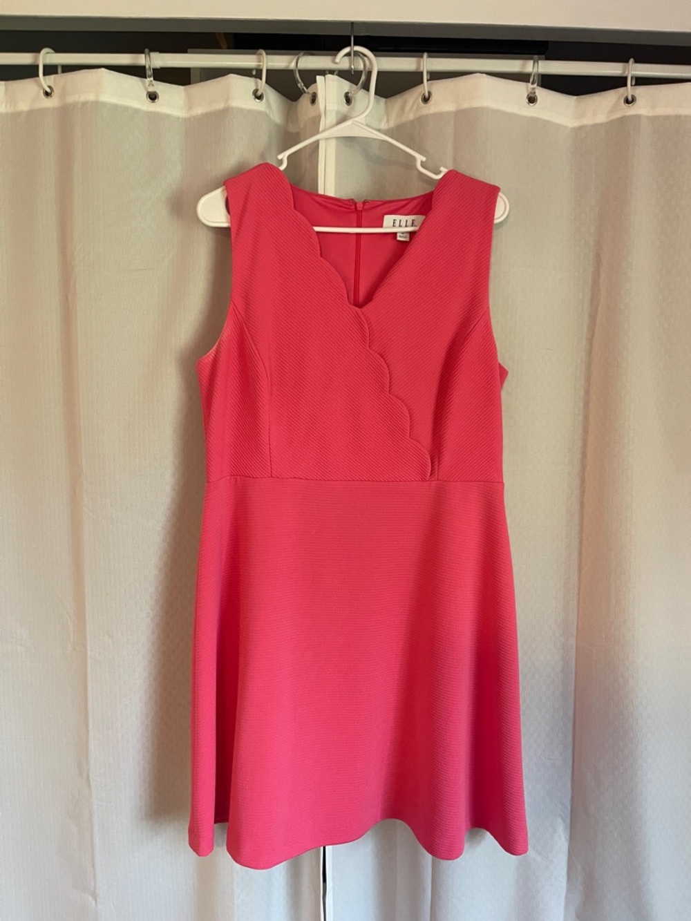Elle Scalloped V-Neck Sleeveless Mini Dress in Pink.